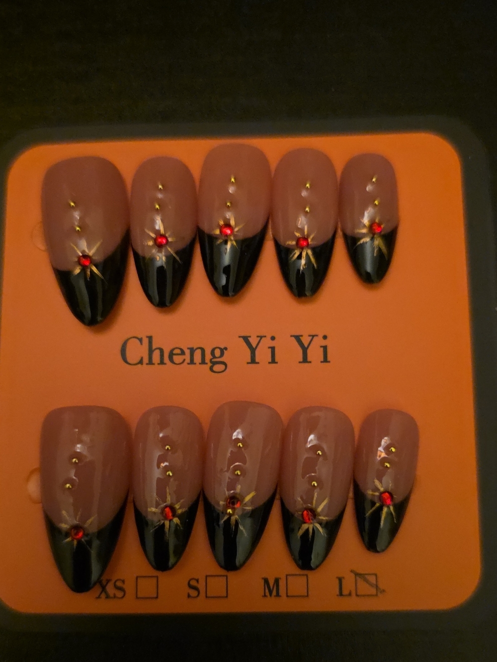 Unk Nude Pink and Black Rhinestone Starburst Press-On Nails